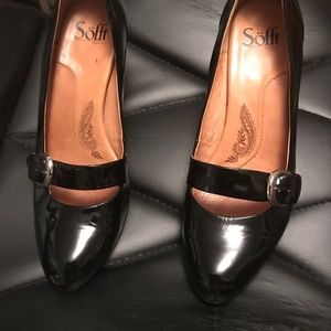 Mary Jane patent leather pumps.